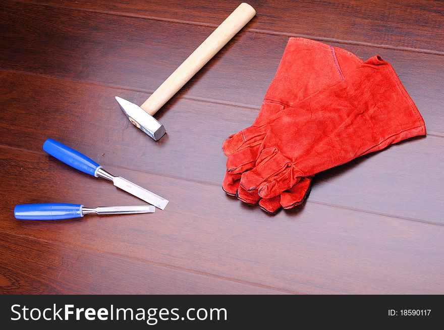 Gloves for working in red and blue tools