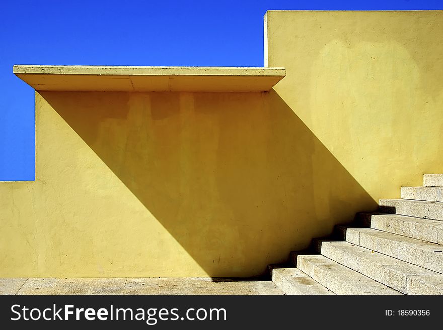Yellow walls on blue sky background