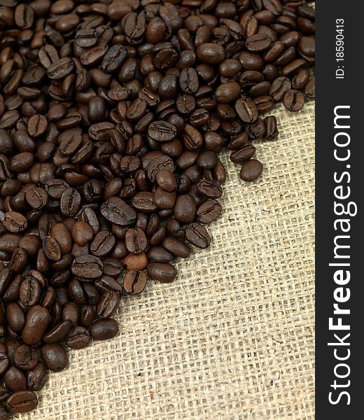 Coffee beans on a brown hessian bag