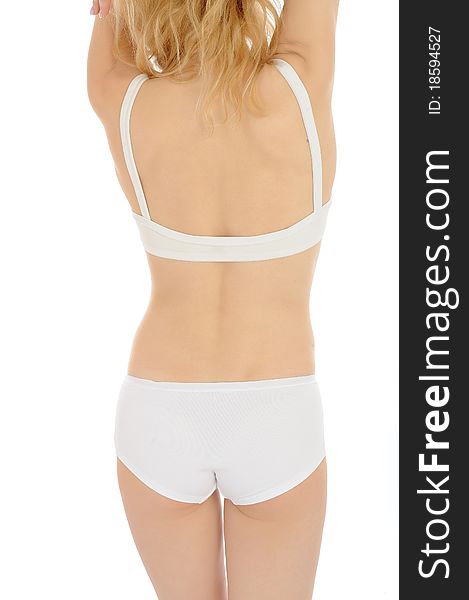 Part of beautiful fit slim woman body in white underwear from the back. isolated