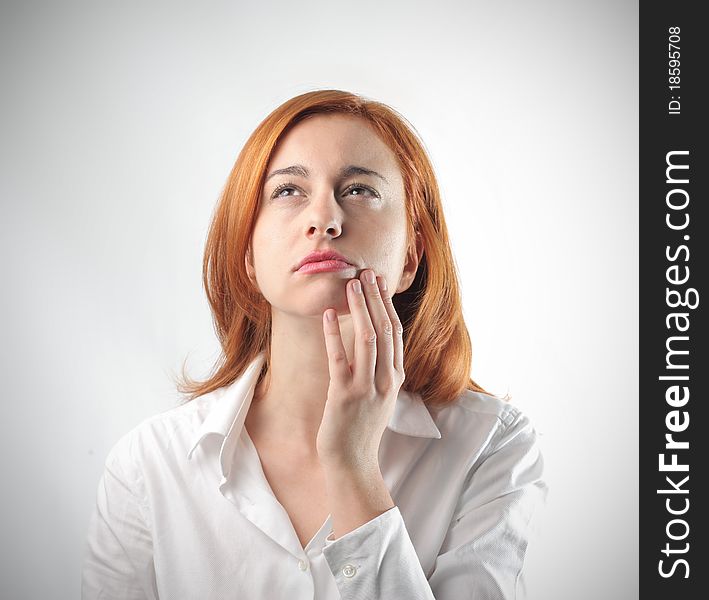 Young woman with thoughtful expression. Young woman with thoughtful expression