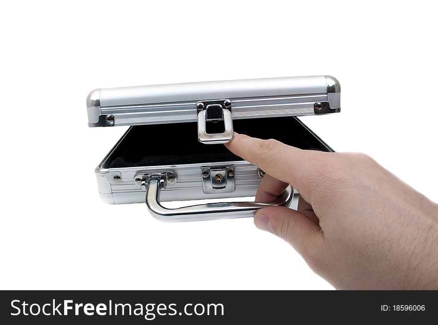 Open metal suitcase on a white background