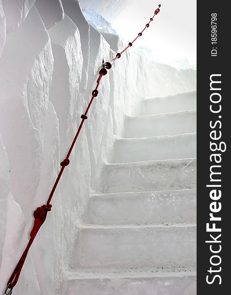 Ice and snow stairway and rope