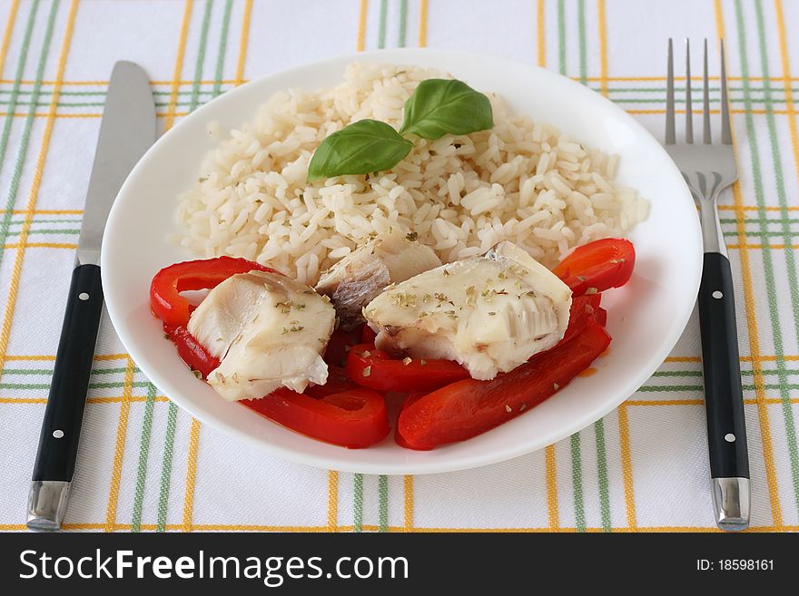 Boiled fish pepper, basil and rice. Boiled fish pepper, basil and rice