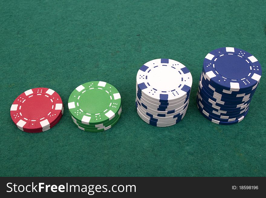 Many poker chips on a white background
