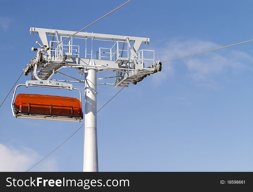 Chairlift and mountain with nice blue sky