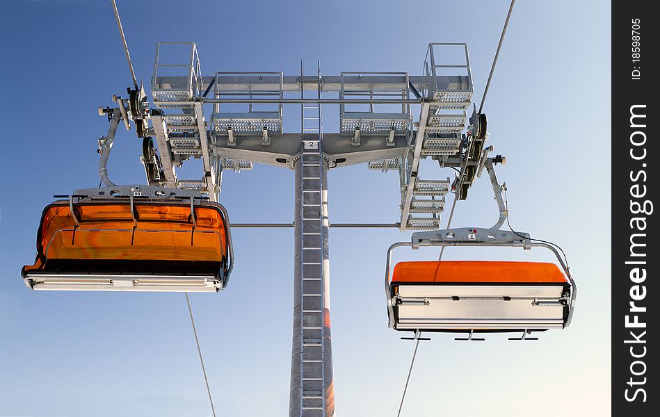 Chairlift and mountain with nice blue sky