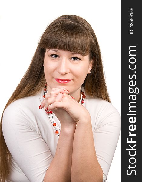 Portrait of young woman in white blouse