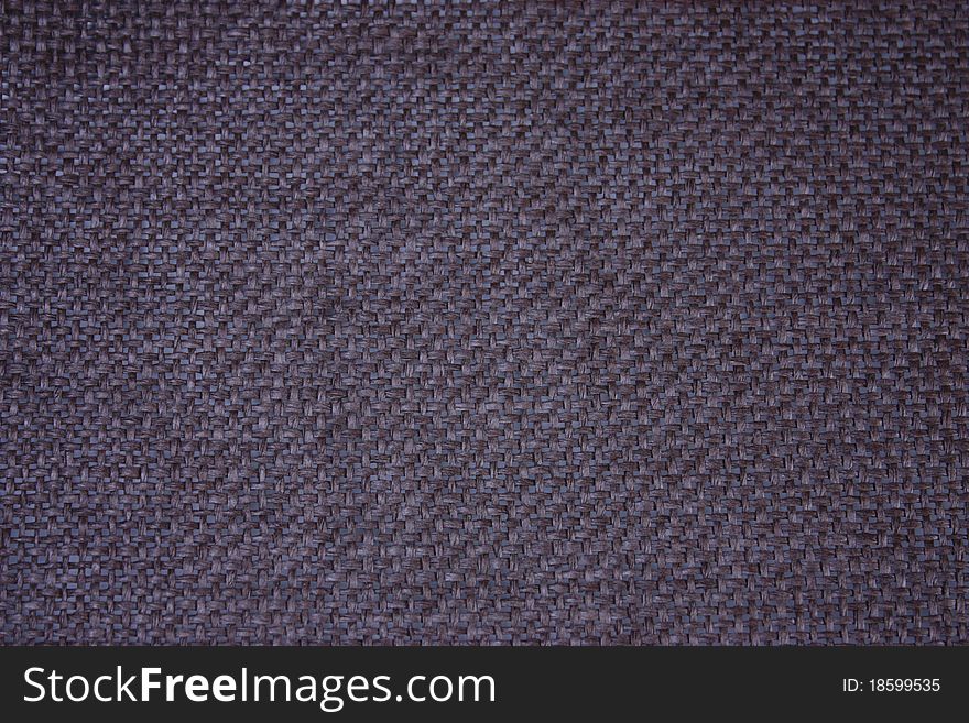 Loosely woven black fabric to be used as a background. Loosely woven black fabric to be used as a background