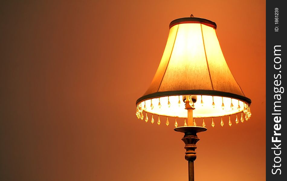 A lamp on a warm background. A lamp on a warm background