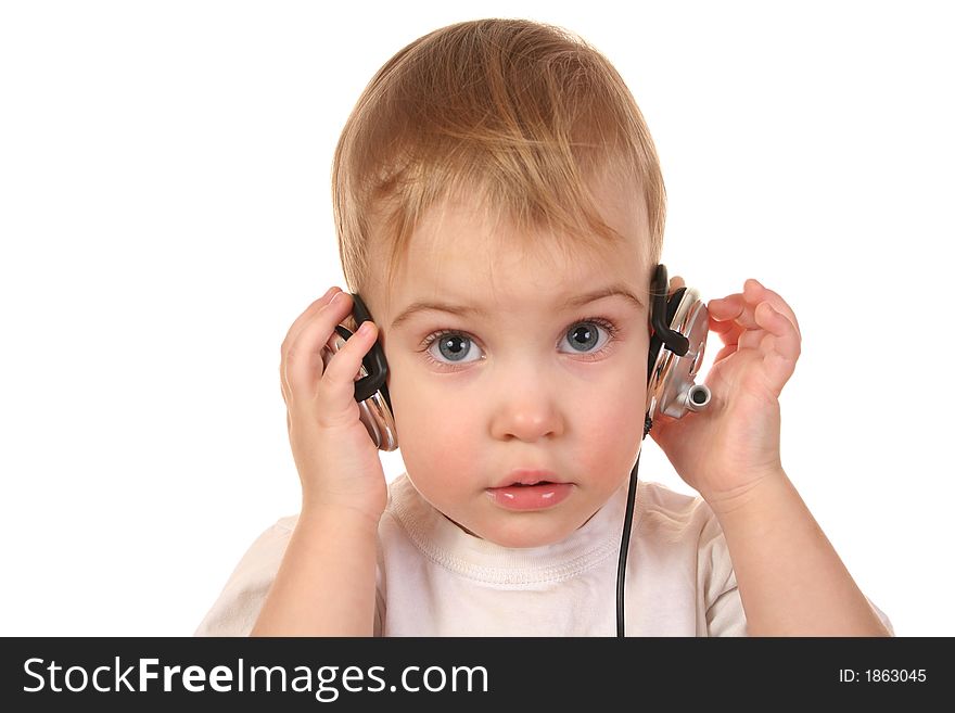 Baby with headphones isolated on white