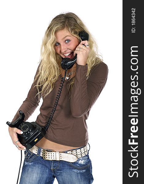 Young sexy blond woman with a telephone in hand. Young sexy blond woman with a telephone in hand