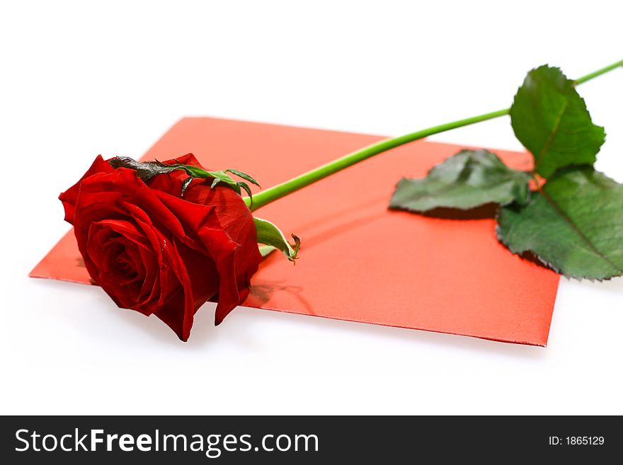 Close up for red rose and letter isolated on white background