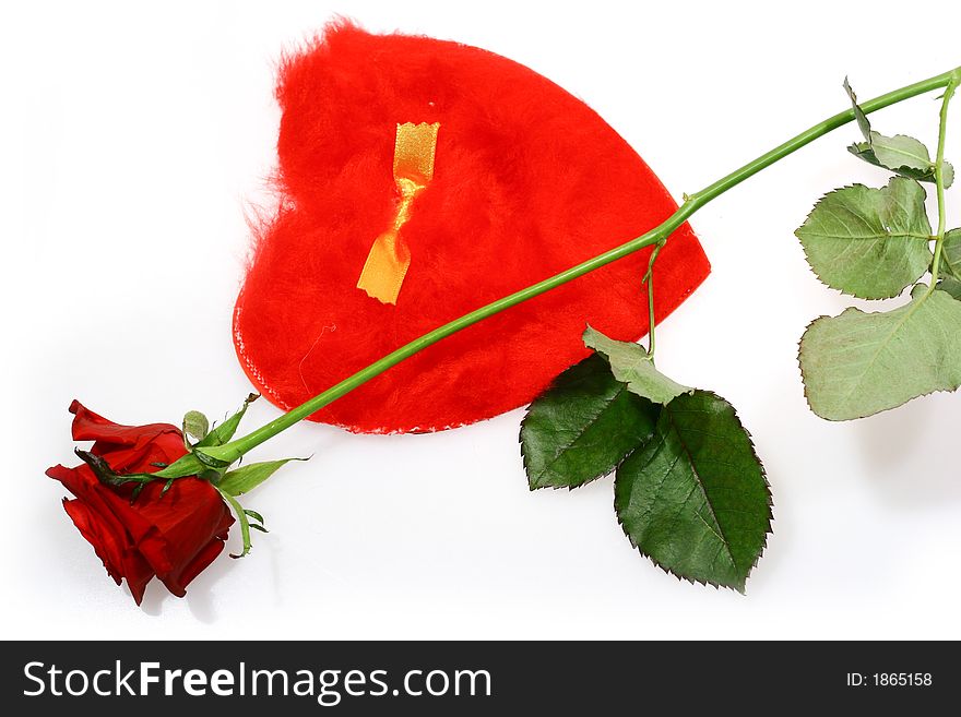 Close up for red rose and heart shape letter isolated on white background