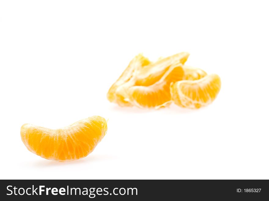 Piece of mandarines isolated on white background