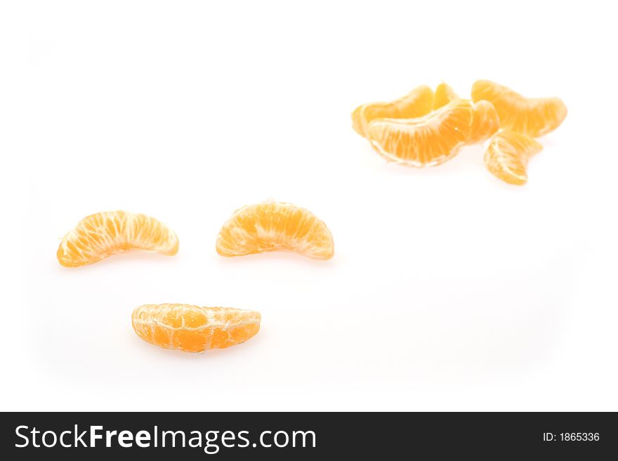 Piece of mandarines isolated on white background