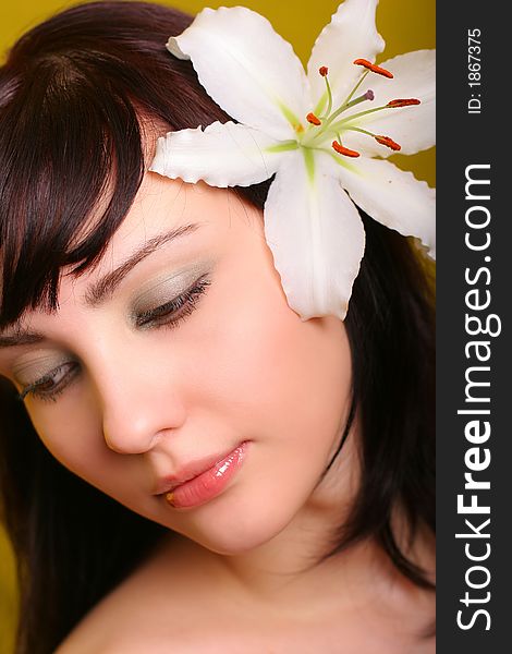 brunette with white lily flowers