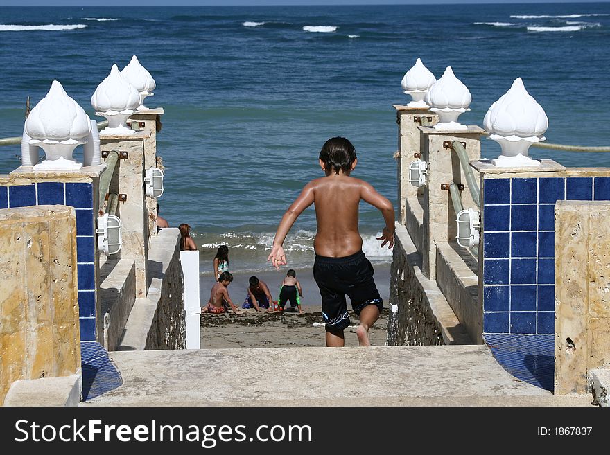 Little boy child running to the beach. Little boy child running to the beach