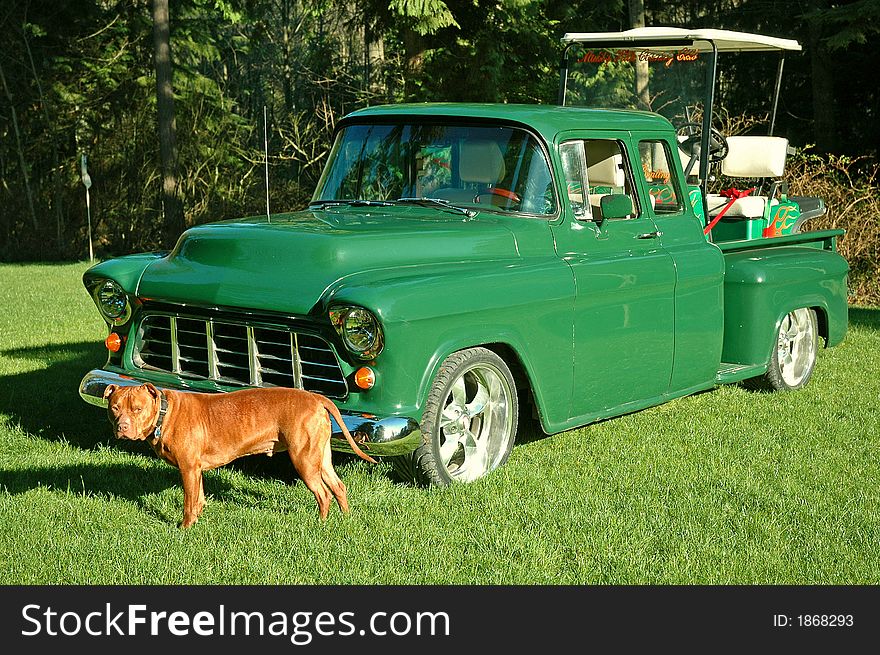 1955 Chevy pickup hauling a golf cart. 1955 Chevy pickup hauling a golf cart