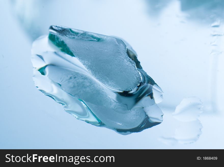 Ice cubes on a reflective surface