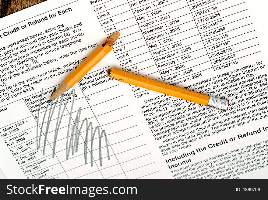 Tax form with pencil marks showing frustration. Tax form with pencil marks showing frustration