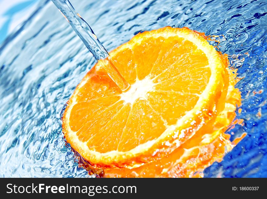 Orange in water splash
