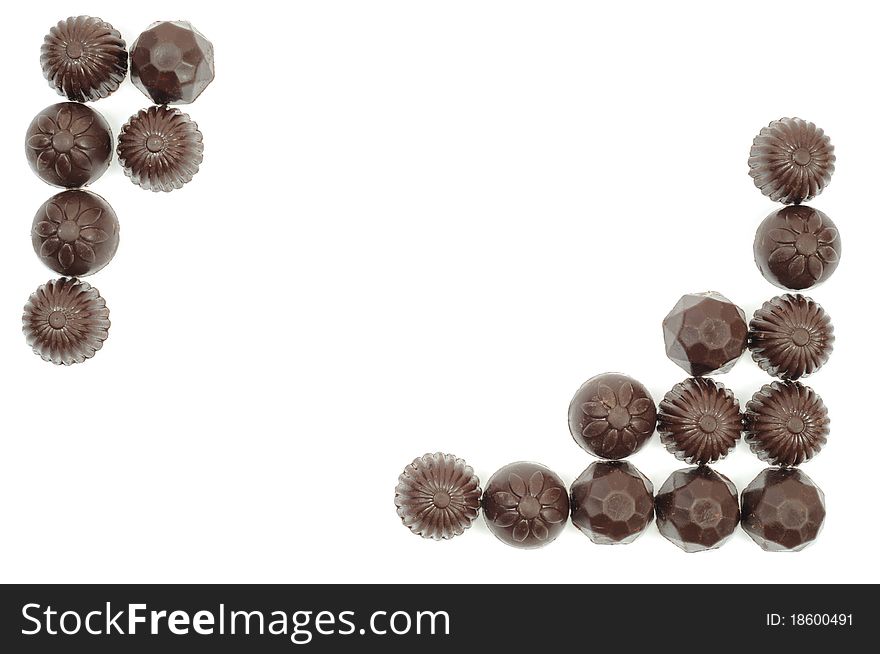 Frame made from chocolat on a white background. Frame made from chocolat on a white background