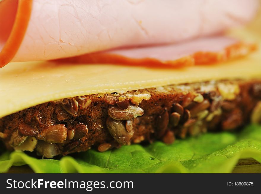 Sandwich with ham and cheese. close up