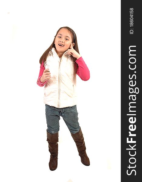 A young pretty girl, holding a light bulb has a brainstorm about an idea, standing in jeans and boots for white background. A young pretty girl, holding a light bulb has a brainstorm about an idea, standing in jeans and boots for white background.