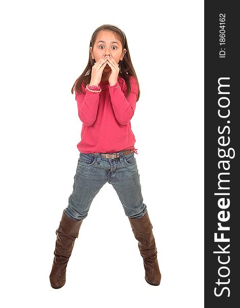 A young girl in jeans and a pink sweater and boots holding her moths because she talked to much, for white background. A young girl in jeans and a pink sweater and boots holding her moths because she talked to much, for white background.