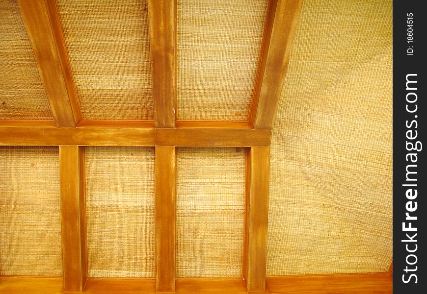 An old roof structure made of wood blocks and jute mat. An old roof structure made of wood blocks and jute mat.