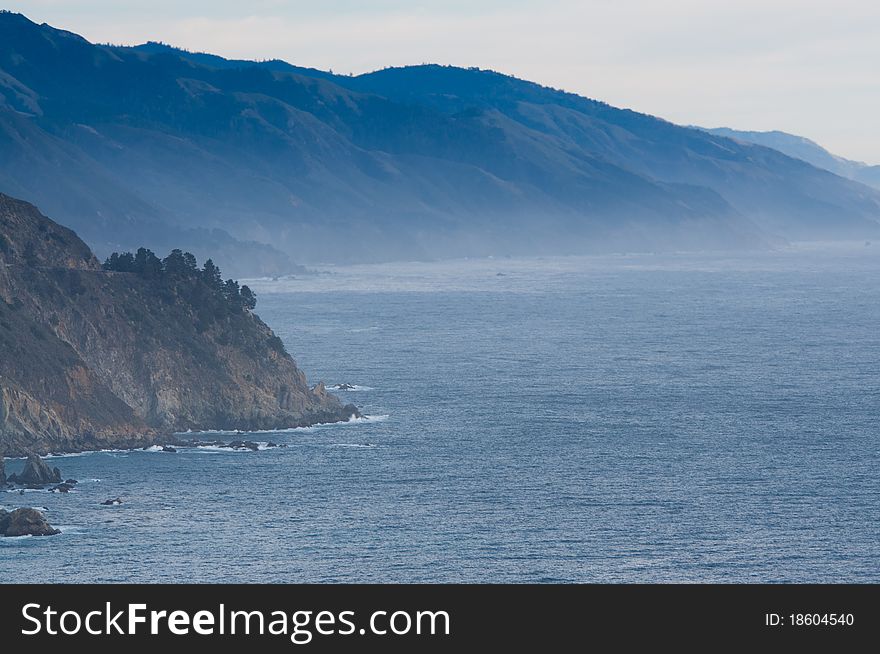 Peaceful gulf with mountains in the mist. Peaceful gulf with mountains in the mist