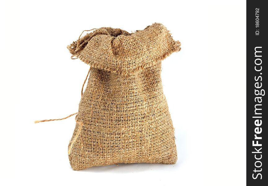 Burlap gift sack isolated on white background