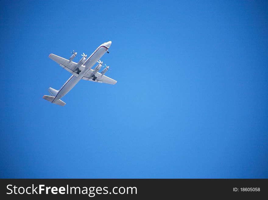Big passenger airplane flying against blue sky background. Big passenger airplane flying against blue sky background