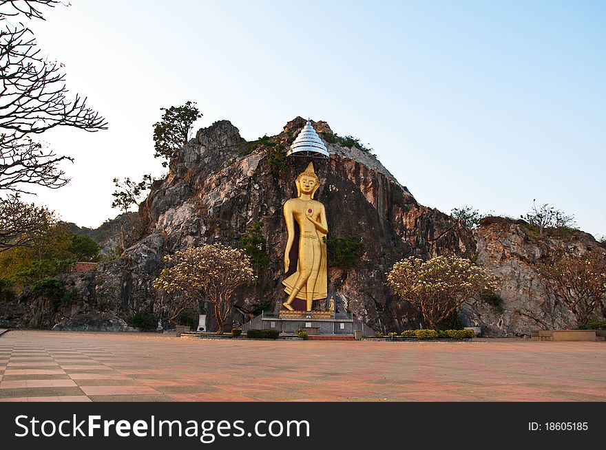 Big image of buddha at mountain in thailand