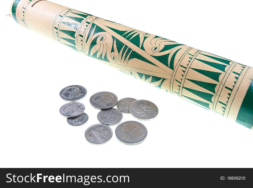 Coin And Traditional Bamboo Tubes