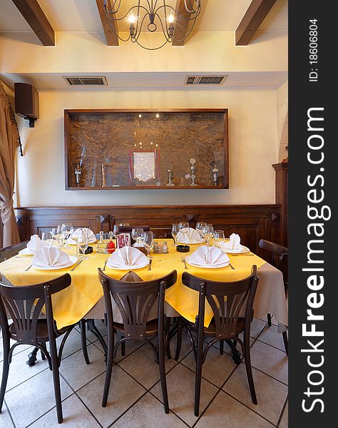 Tables, chairs and lighting equipment of a restaurant. Tables, chairs and lighting equipment of a restaurant.