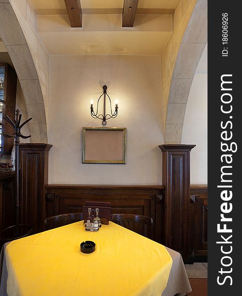 Tables, chairs and lighting equipment of a restaurant. Tables, chairs and lighting equipment of a restaurant.