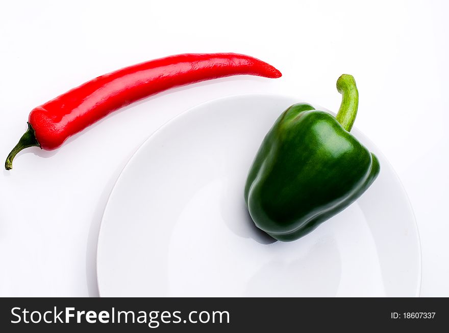 Red hot and green sweet peppers. Red hot and green sweet peppers