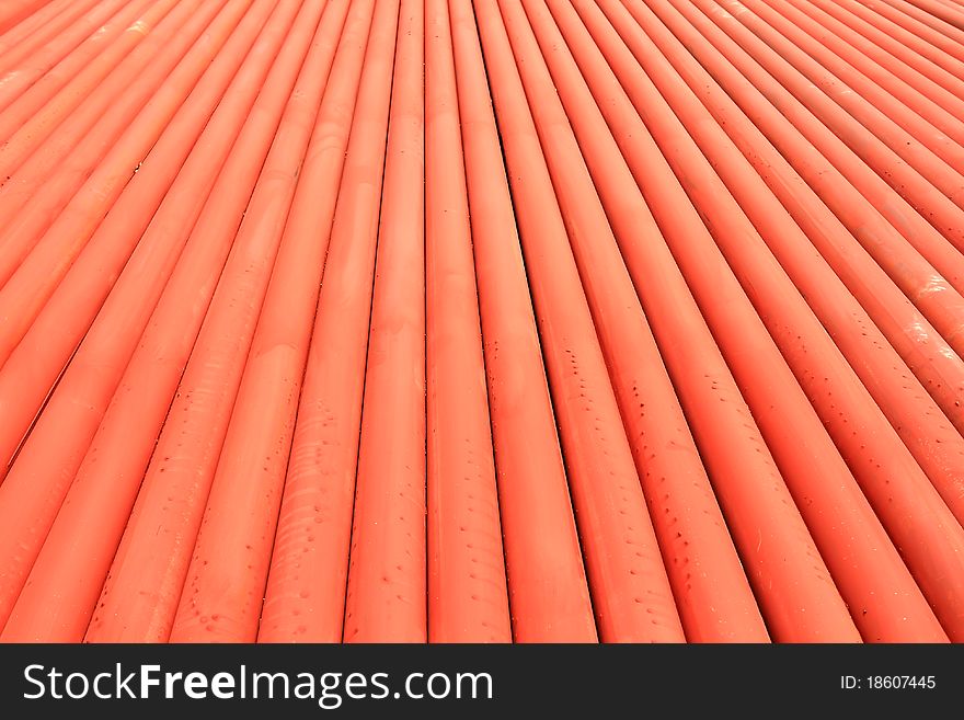 Stack of metallic pipes in a construction site