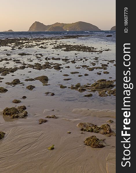 Exposed rock pools on the east cost of Lord Howe Is. Sunset over beach at low tide. Exposed rock pools on the east cost of Lord Howe Is. Sunset over beach at low tide