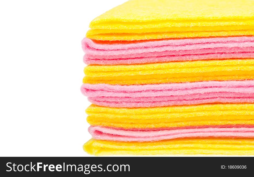 Close-up stack of rags with blank place, isolated on white