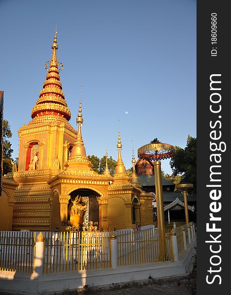 Golden pagoda in a temple.Northern Thailand.