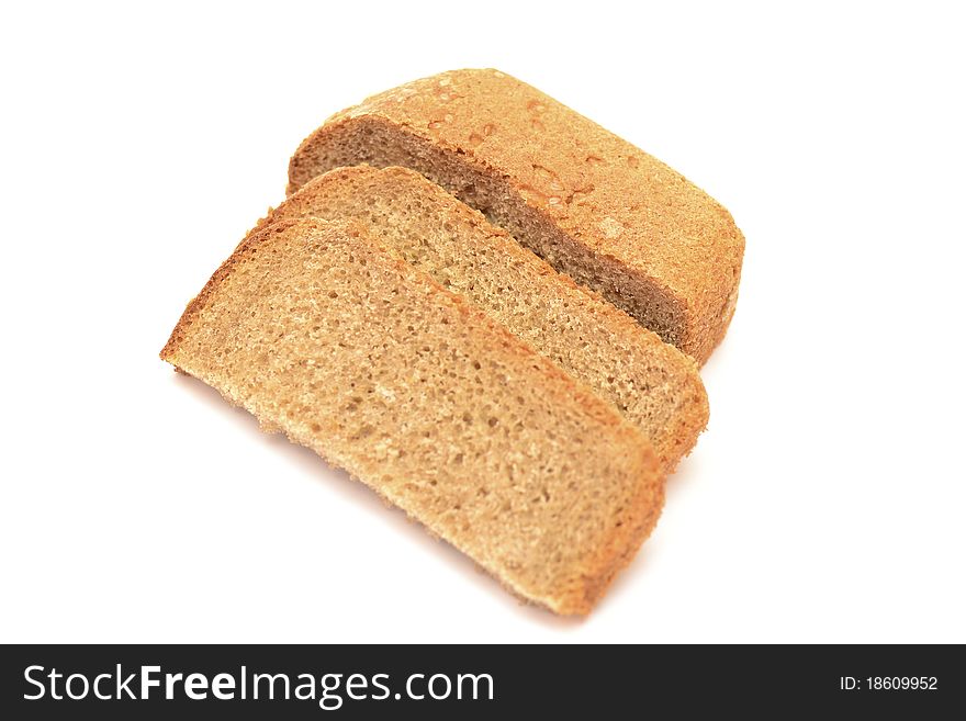 Photo of slices of black bread on a white background. Photo of slices of black bread on a white background.