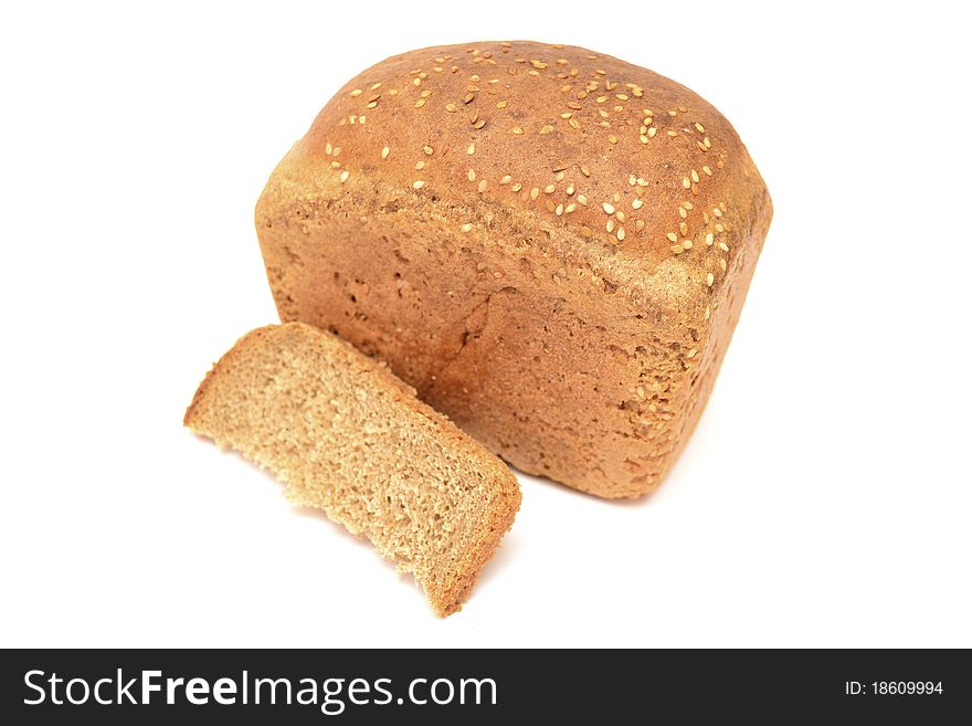 Photo of a roll of black bread on a white background. Photo of a roll of black bread on a white background.