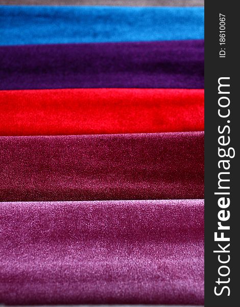 Fabrics of various colors in the furniture store. Fabrics of various colors in the furniture store