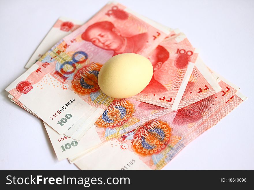 Chinese money,100RMB and egg. Chinese money,100RMB and egg