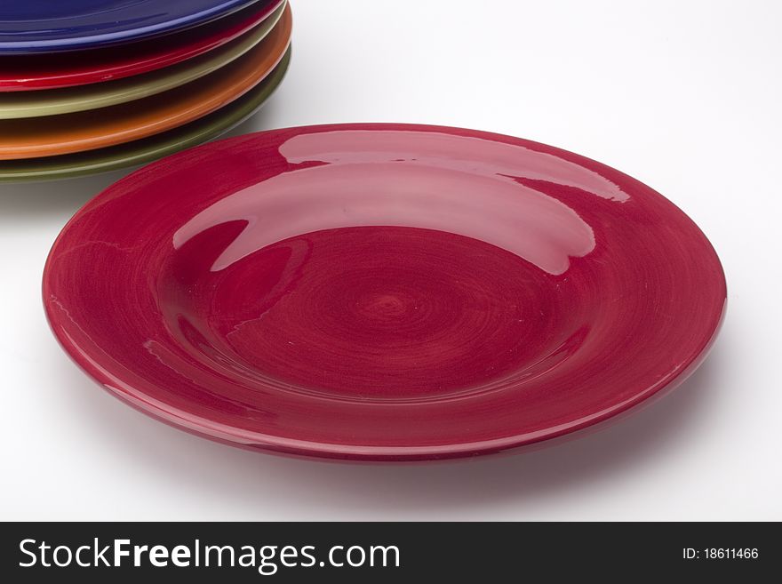 Colorful ceramic plates for the main dishes.