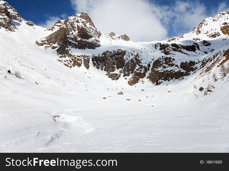 Icy Valley. Top of Caneâ€™s Valley during winter, before a snowfall. Brixia province, Lombardy region, Italy