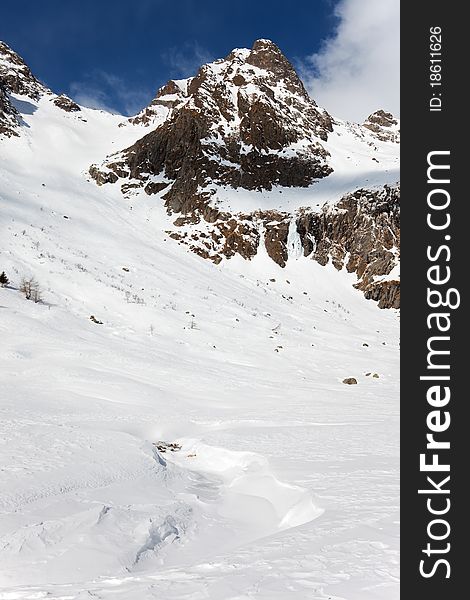 Icy Valley. Top of Caneâ€™s Valley during winter, before a snowfall. Brixia province, Lombardy region, Italy